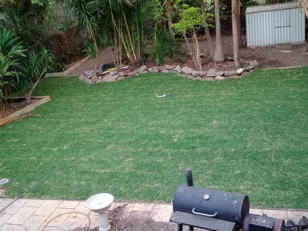 The finished lawn along the garden bed.